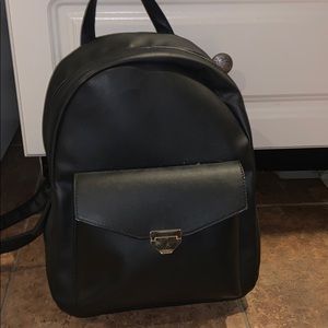 Black with gold zipper fashion backpack